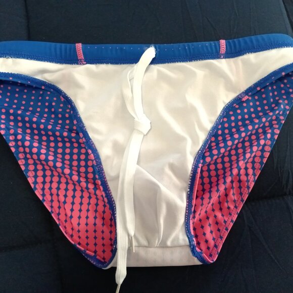 NWOT SWIM BRIEF, APPROX. 2" SIDES, SIZE "S", ROYAL BLUE AND PINK. - Picture 5 of 7